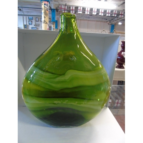 432 - A large art glass green glass bottle vase 33cm tall