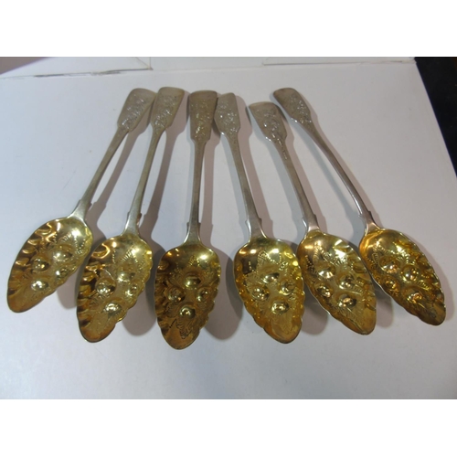 105 - A set of six Victorian solid silver & gilt large berry spoons (although all the spoons match the spo... 