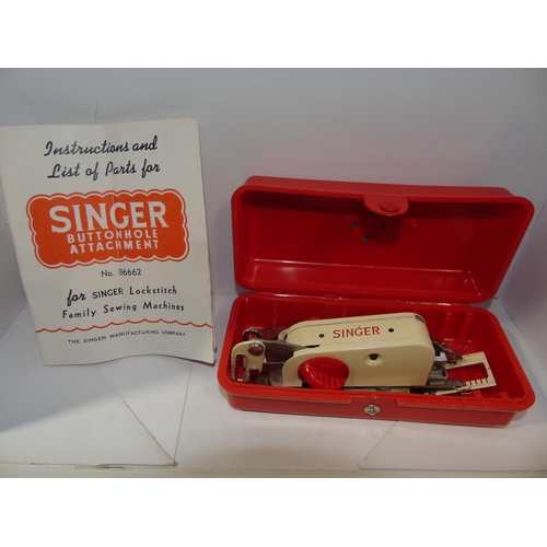 24 - A boxed vintage Singer sewing machine accessory