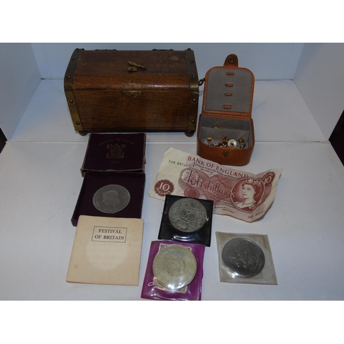 240 - A small wooden oak chest & contents