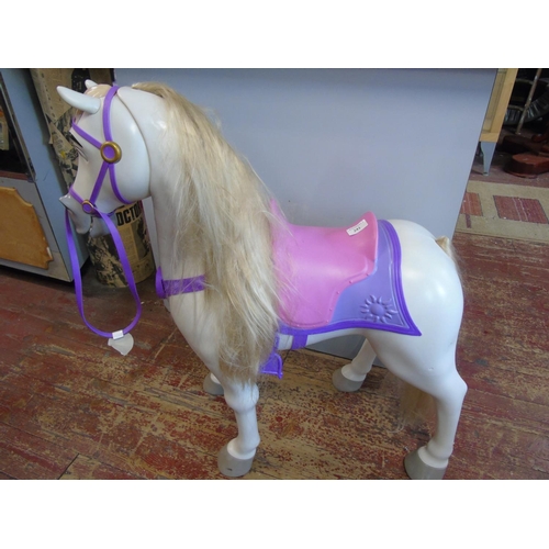 241 - A Disney Maximus (Tangled) large child's sit on horse with nodding head and horse noises. 84cm tall