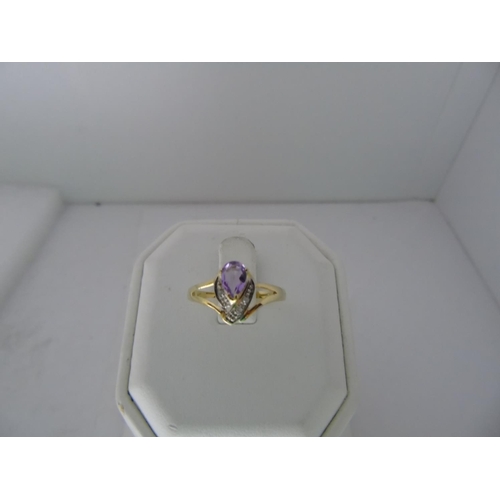 543 - A 9ct gold amethyst & diamond ring size O