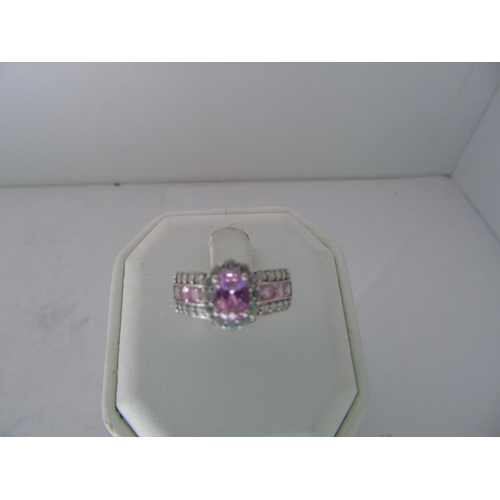 552 - A 9ct gold pink & white stone ring size N