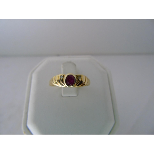 558 - A 14ct gold ruby & diamong ring size N