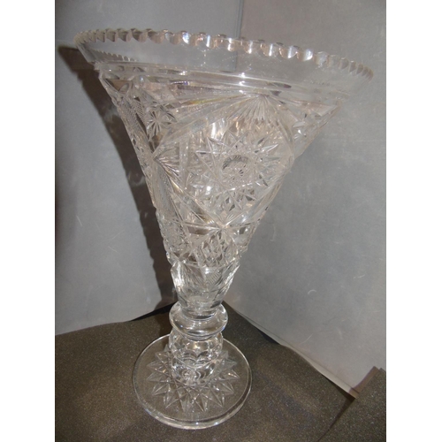 64 - A large and quality wheel cut Crystal vase with insert. 34cm tall