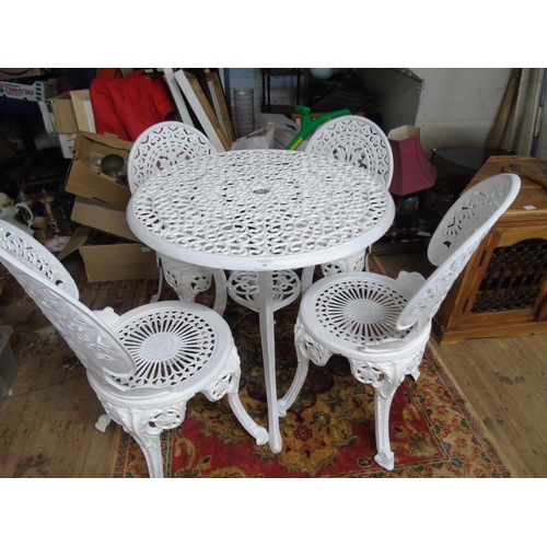 68 - A good quality cast alloy table & four chairs