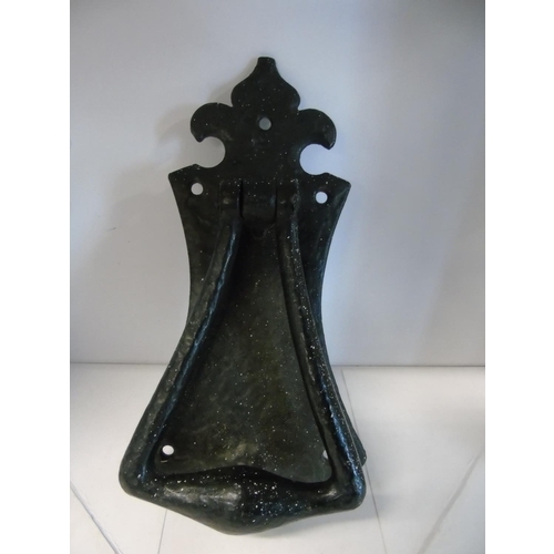 247 - A vintage style wrought iron door knocker. 22cm tall