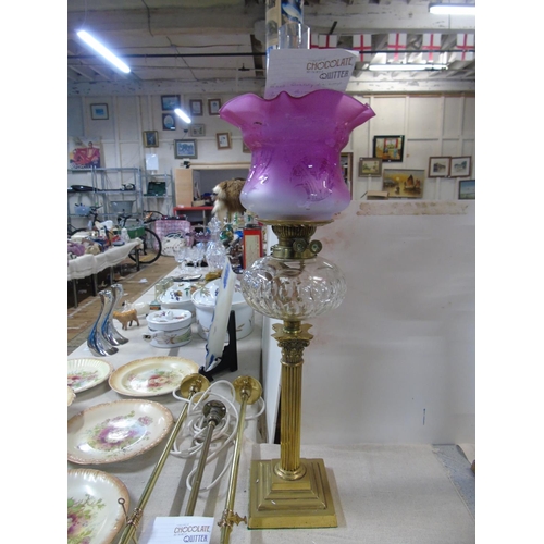 32 - A quality oil lamp with brass column and duplex burner 70cm tall