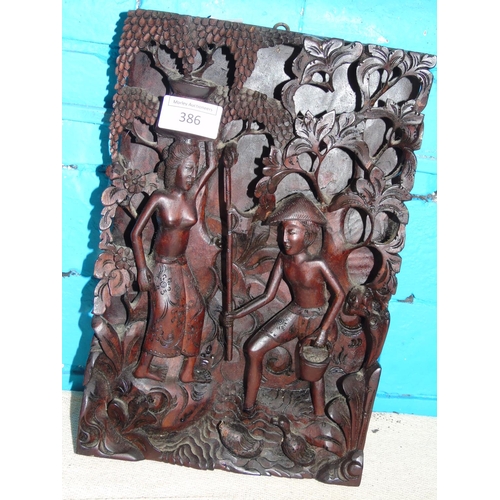 386 - A nicely carved Oriental wooden wall plaque