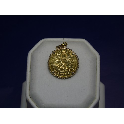 162 - A 1977 Royal Life Boat Insitute gold coin in a 9ct mount (total weight 4 grams)