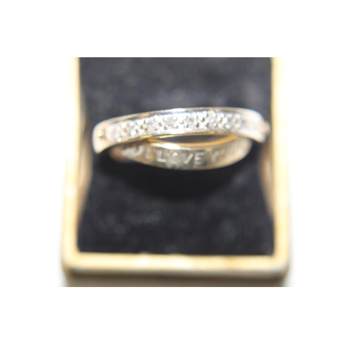 139 - A 9ct gold & diamond message ring