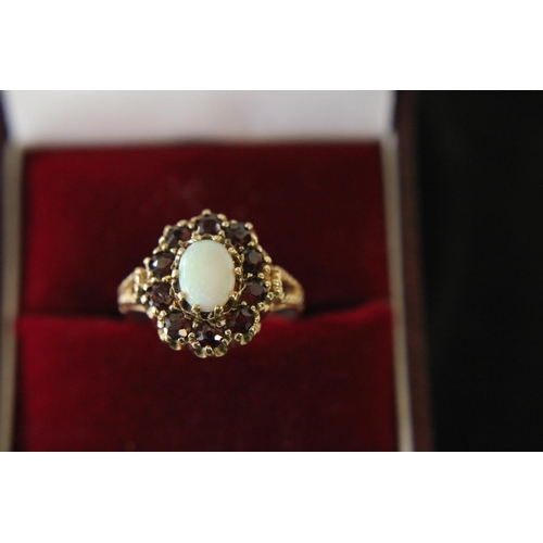 140 - A vintage 9ct gold & opal ring