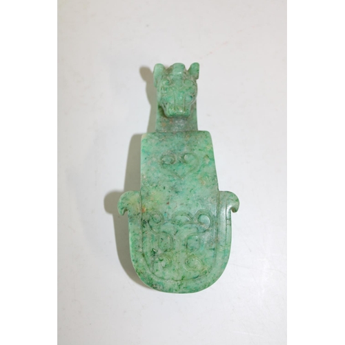 621 - A Chinese green jade belt hook in the form of a dragon