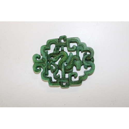 622 - A hand double carved Chinese green jade plaque