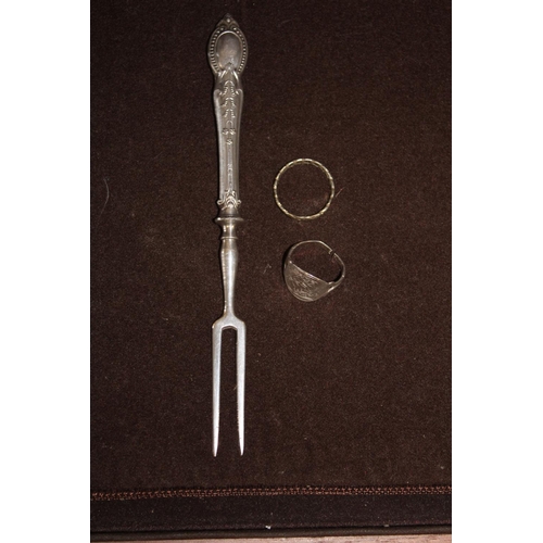 145 - A silver handled toasting fork & two other silver items