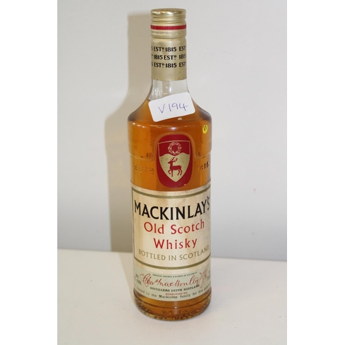 604 - A vintage bottle of Mackinlay's old scotch whisky 26 2/3 fl ozs 70 % proof