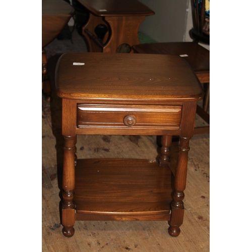 83 - An Ercol side table with draw
Collection Only. 48cm x 45cm