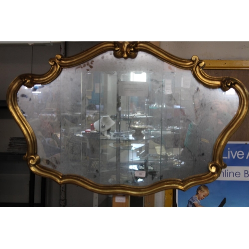 99 - A gold framed vintage mirror 90cm x 56cm
Collection Only