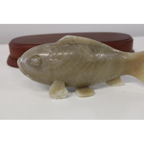 599 - A large jade carp 25cm long x 10cm deep