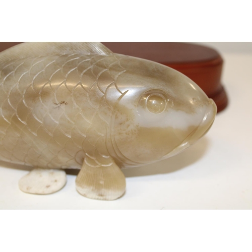 599 - A large jade carp 25cm long x 10cm deep