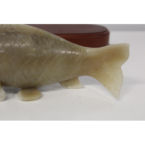 599 - A large jade carp 25cm long x 10cm deep