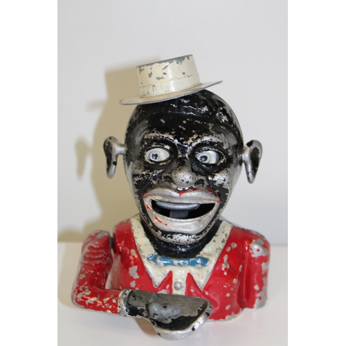 415 - A vintage jolly man money box