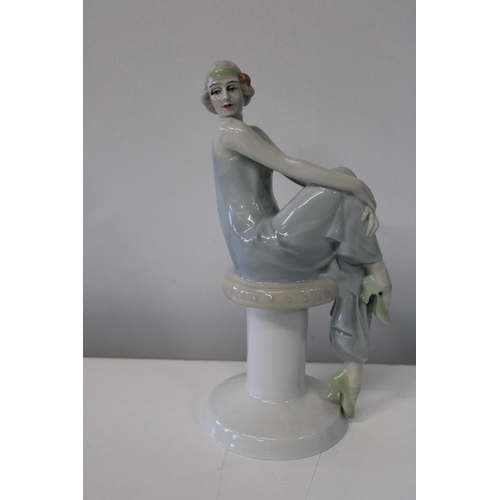 13 - A Royal Doulton figurine HN 3071.
Height 26cm