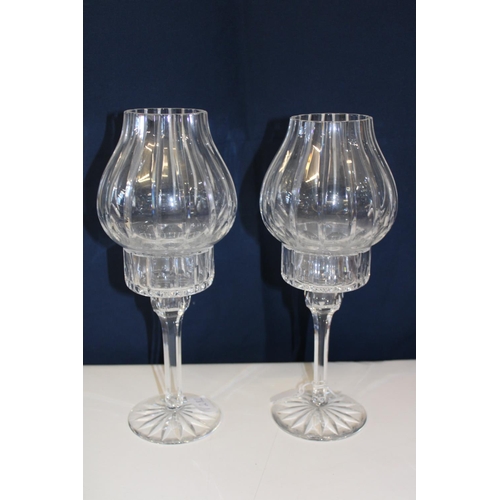 40 - A pair of cut glass candle holders with shades.
Height 31cm