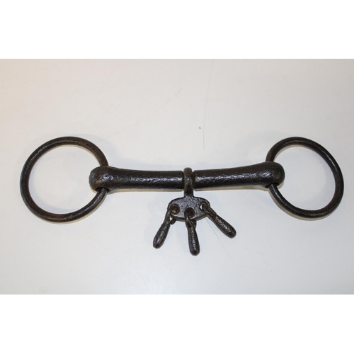 42 - A antique cast iron horse bit