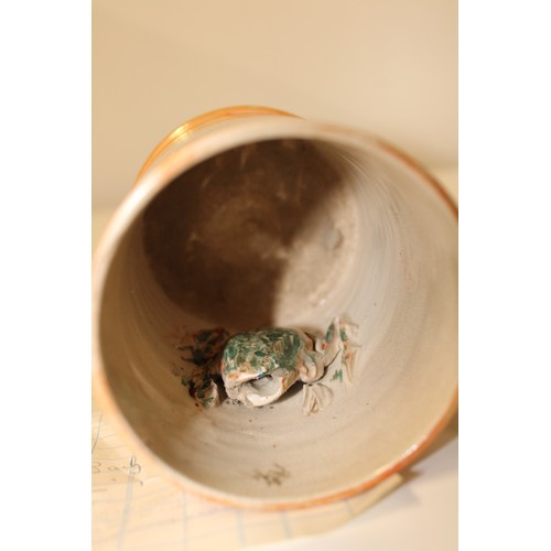 217 - A mid 19th century Sunderland luster ware frog mug 13cm tall. (slight damage to the mouth of the fro... 