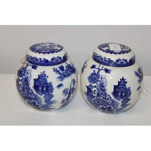 11 - A pair of Burleigh Ware willow pattern ginger jars