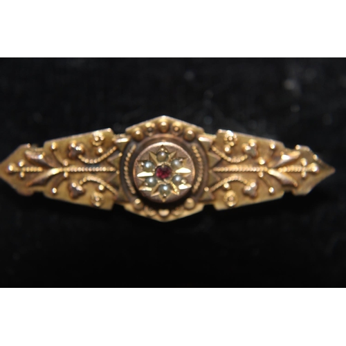 167 - A antique 9ct gold ruby & pearl mourning brooch