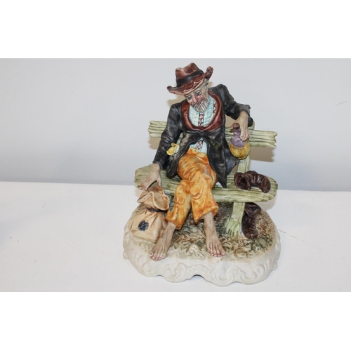 47 - A vintage Capodimonte figurine 23cm tall