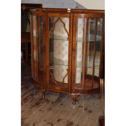 69 - A walnut veenered china display cabinet with two glass shelves 1.17 meters tall x 1.3 meters wide x ... 