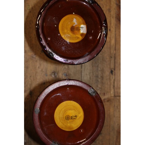 5 - A pair of Royal Doulton candlesticks 25cm tall