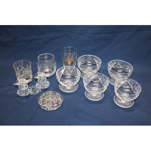 106 - A shelf full of vintage glassware
