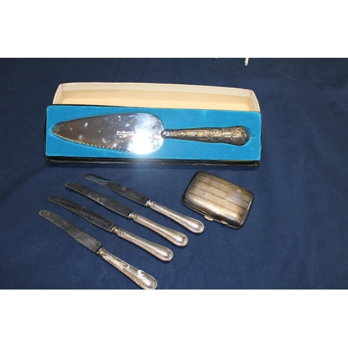110 - A selection of silver handled & silver items