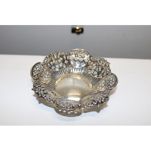 24 - A  small hallmarked silver pierce worked bonbon dish. Hallmarked for Birmingham 1886. Weight 25 gram... 