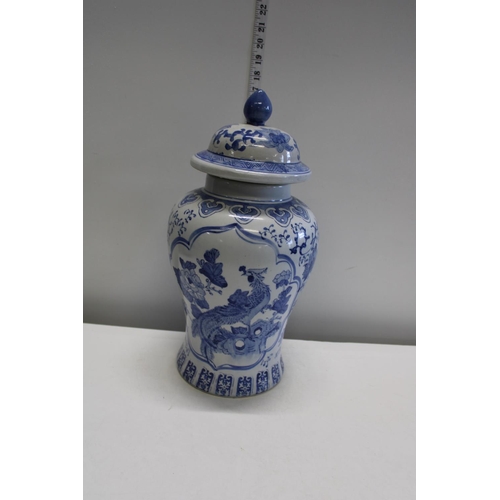 2 - A large hand decorated blue ground ginger jar