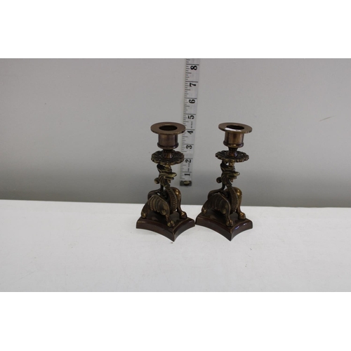 20 - Two unusual bronze candle sticks