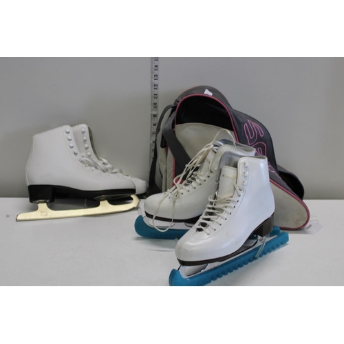 346 - Two pairs of ice skates