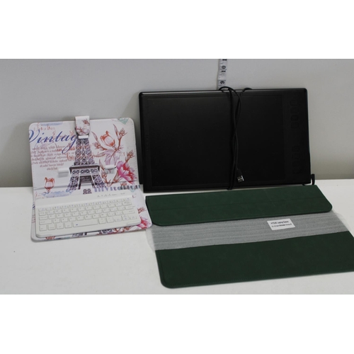 356 - A tablet and a pen/drawing tablet keyboard