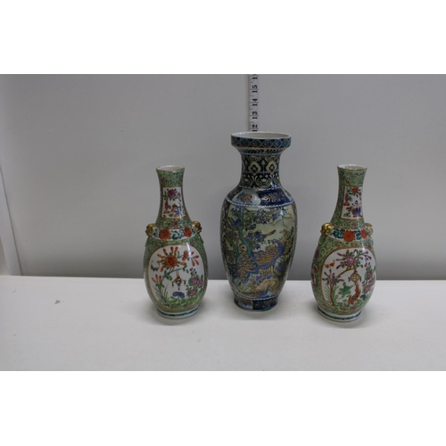 4 - A pair of oriental vases and one other