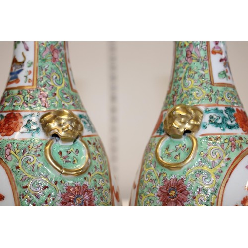 4 - A pair of oriental vases and one other