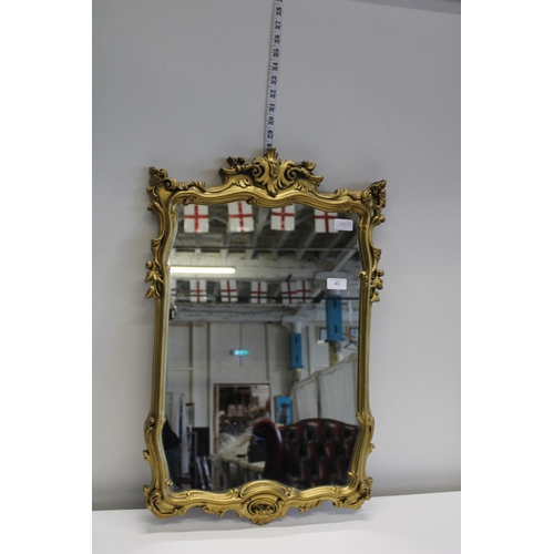 40 - A vintage gilt framed mirror.
72cm  Collection only