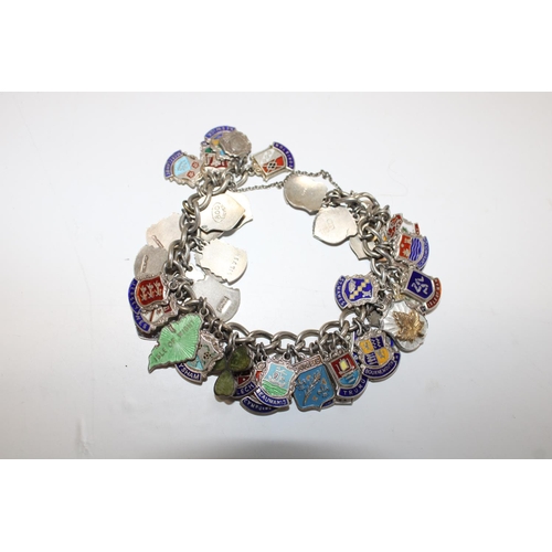 465 - A silver charm bracelet