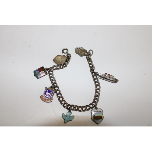 466 - A silver charm bracelet