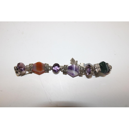 467 - A silver & coloured glass bracelet