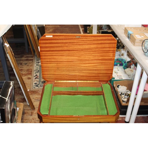 252 - A Sorrento musical sewing/work table
Height 56cm