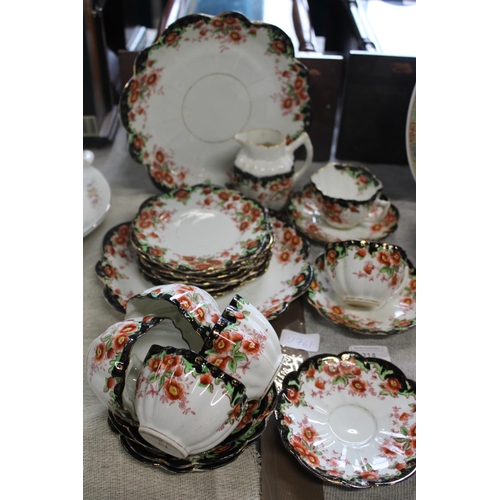 214 - A pretty Edwardian Staffordshire tea service